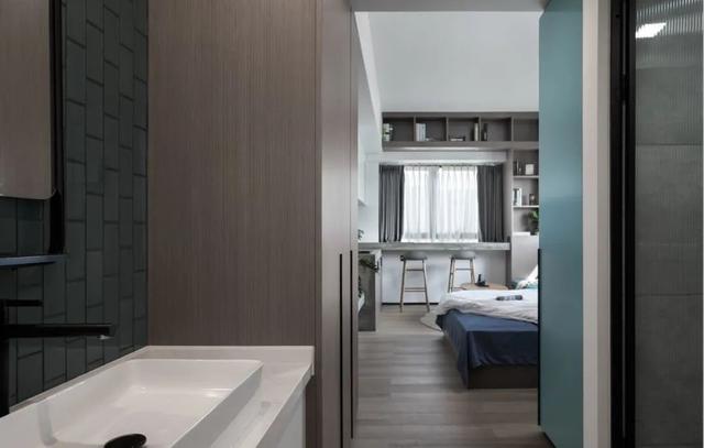 酒店公寓裝修效果圖(35㎡酒店式開間單身公寓，半平米都沒浪費，還裝得很有檔次)(圖2)